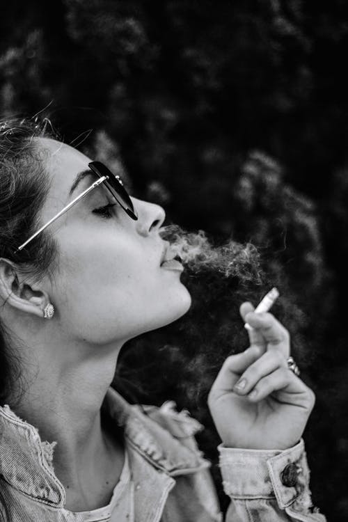 woman smoking a cigarette